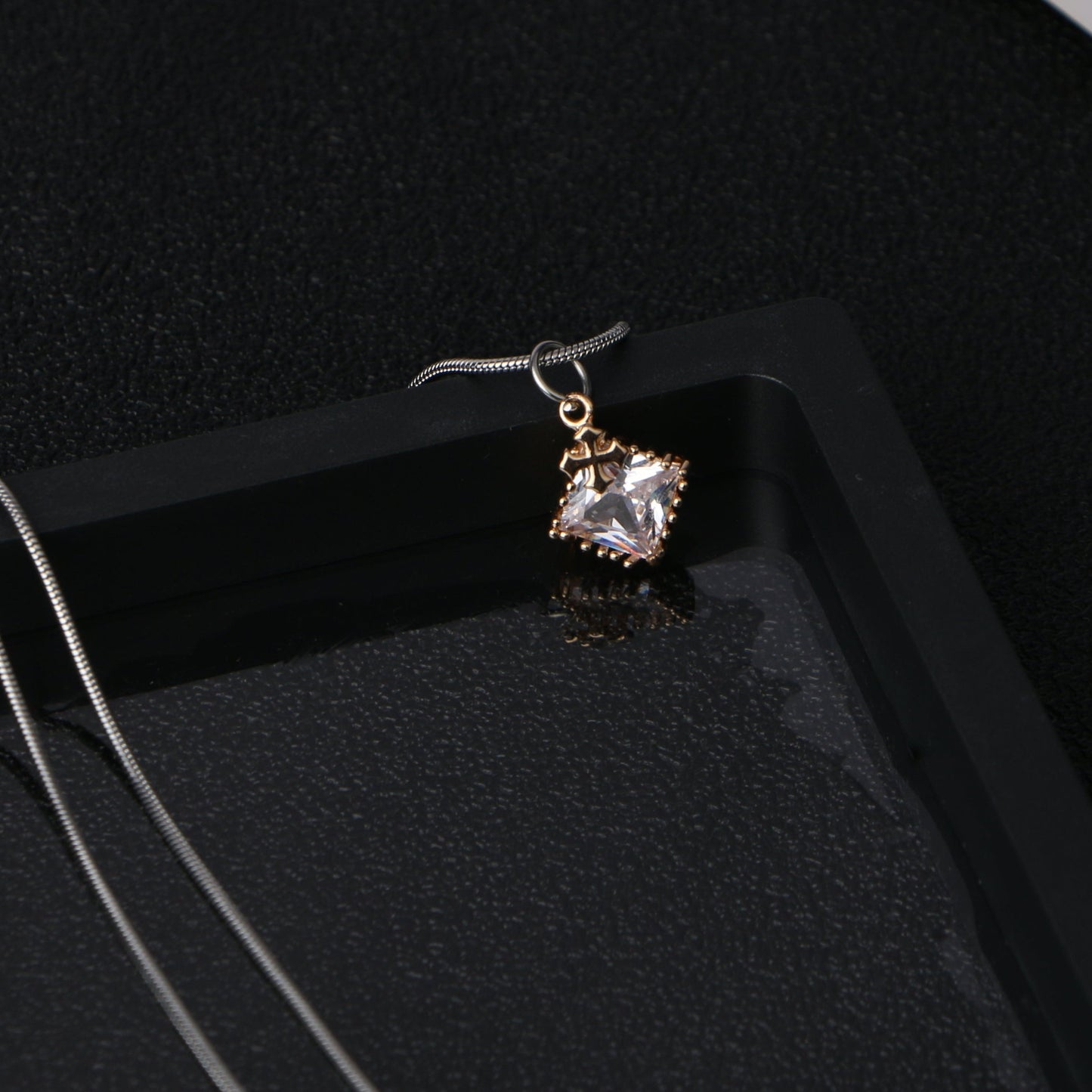 Radiant Cross Diamond Pendant